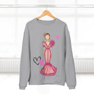 a sweater with a drawing of a woman in a pink dress