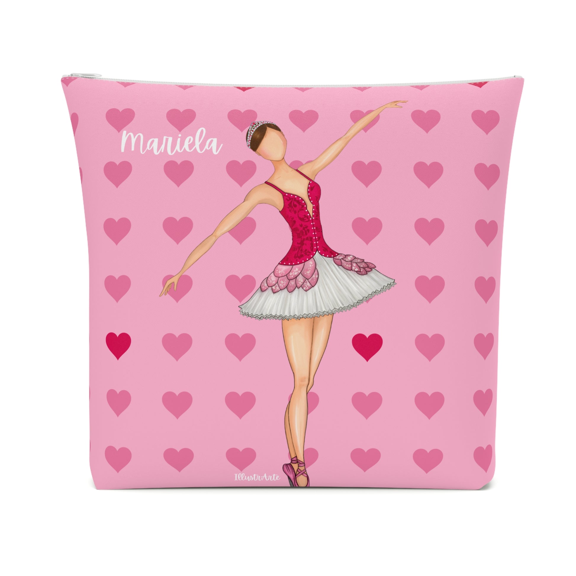 una almohada rosa con una bailarina en ella