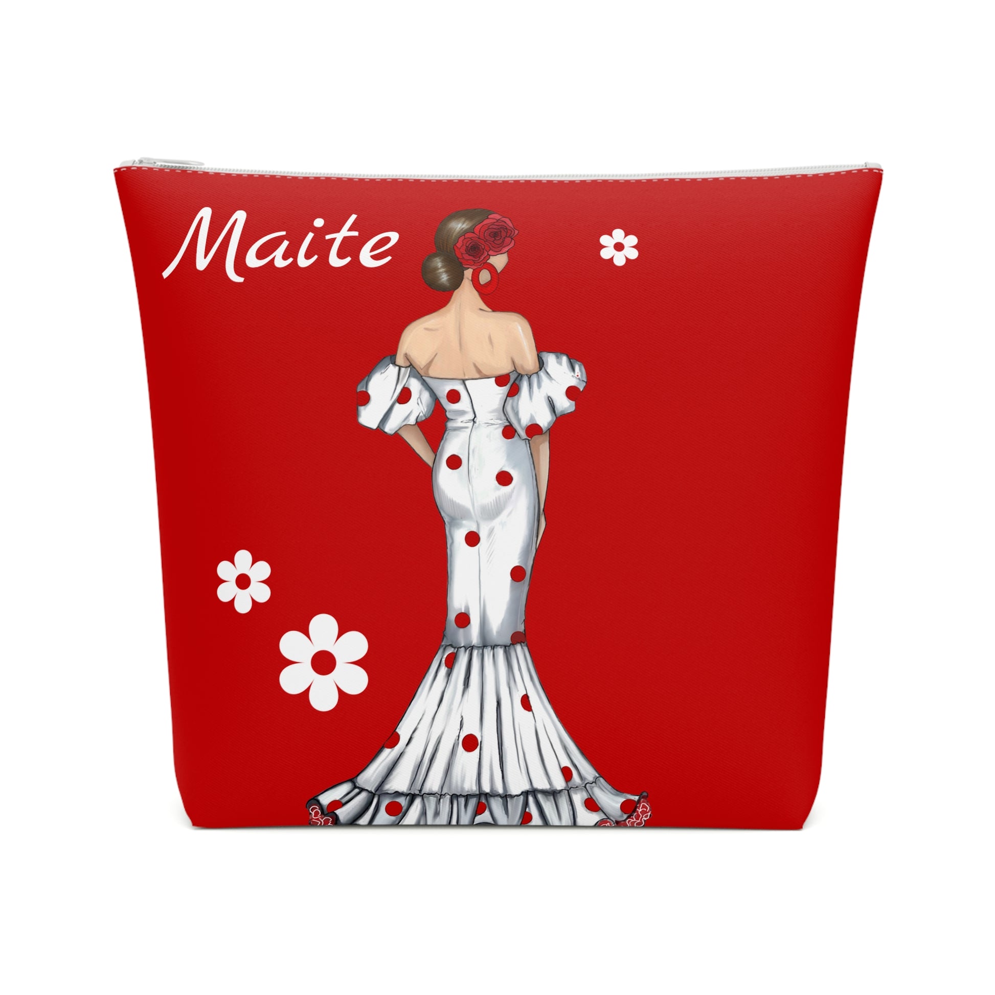 a red and white purse with a woman's dress on it