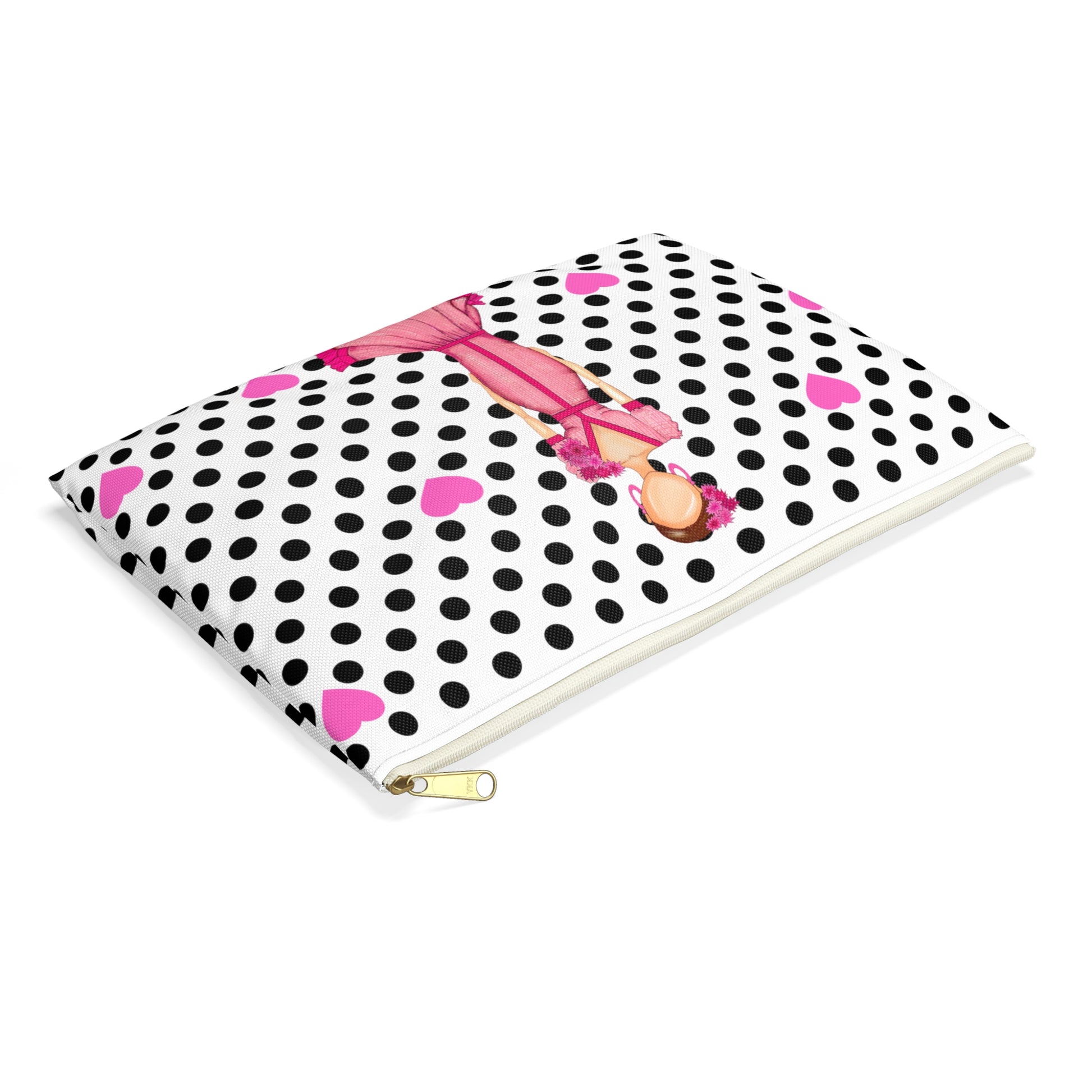 un cuaderno de lunares en blanco y negro con una cinta rosa