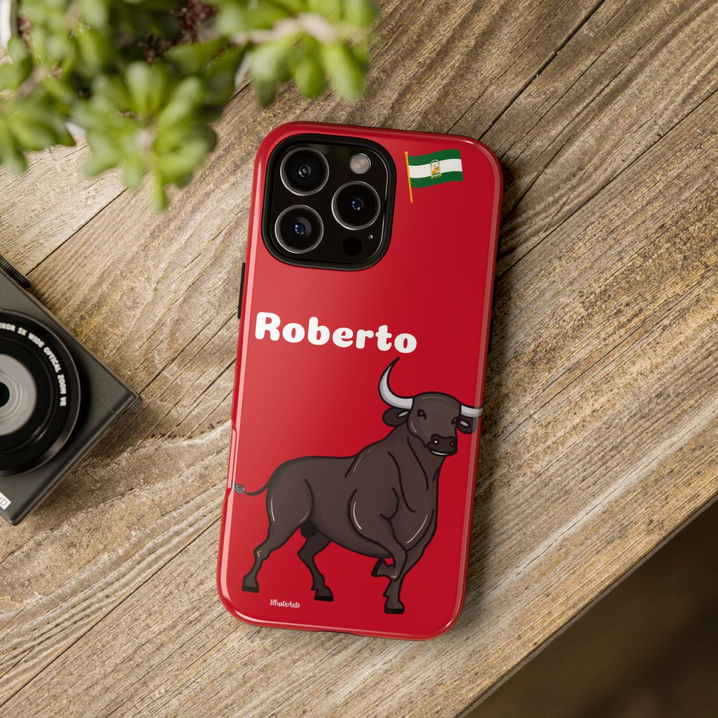 una funda de teléfono roja con un toro en ella