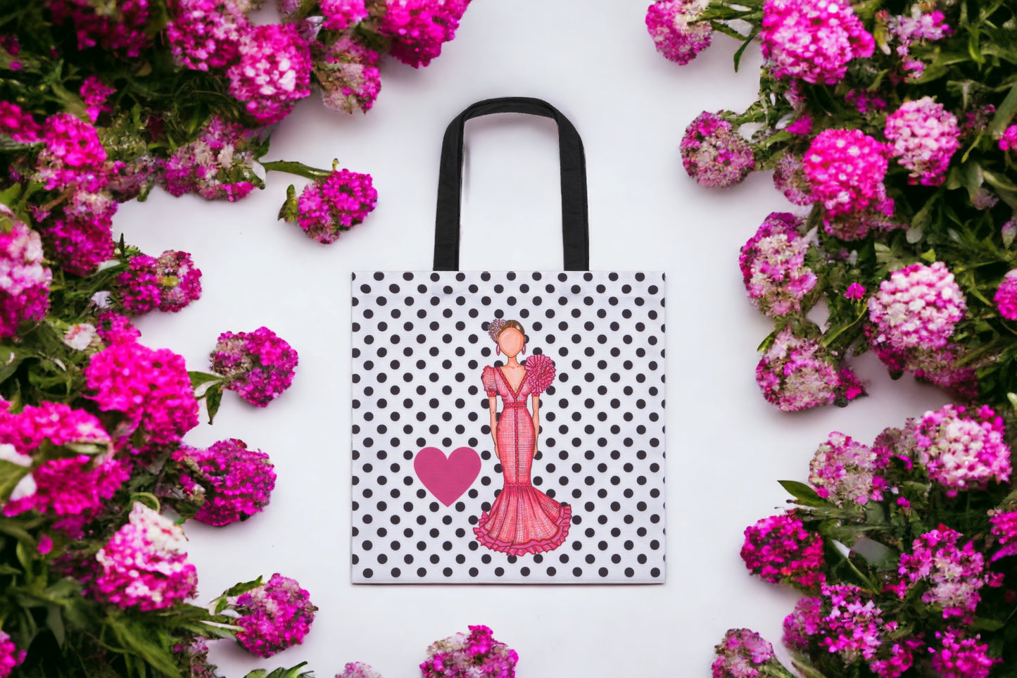 a bag with a picture of a woman on it surrounded by flowers