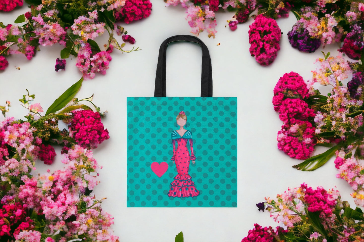 a blue bag with a picture of a woman in a pink dress surrounded by flowers