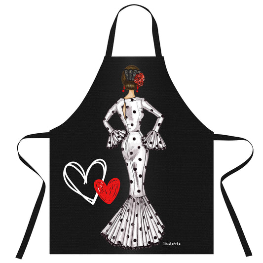 a black apron with a picture of a woman in a polka dot dress and a