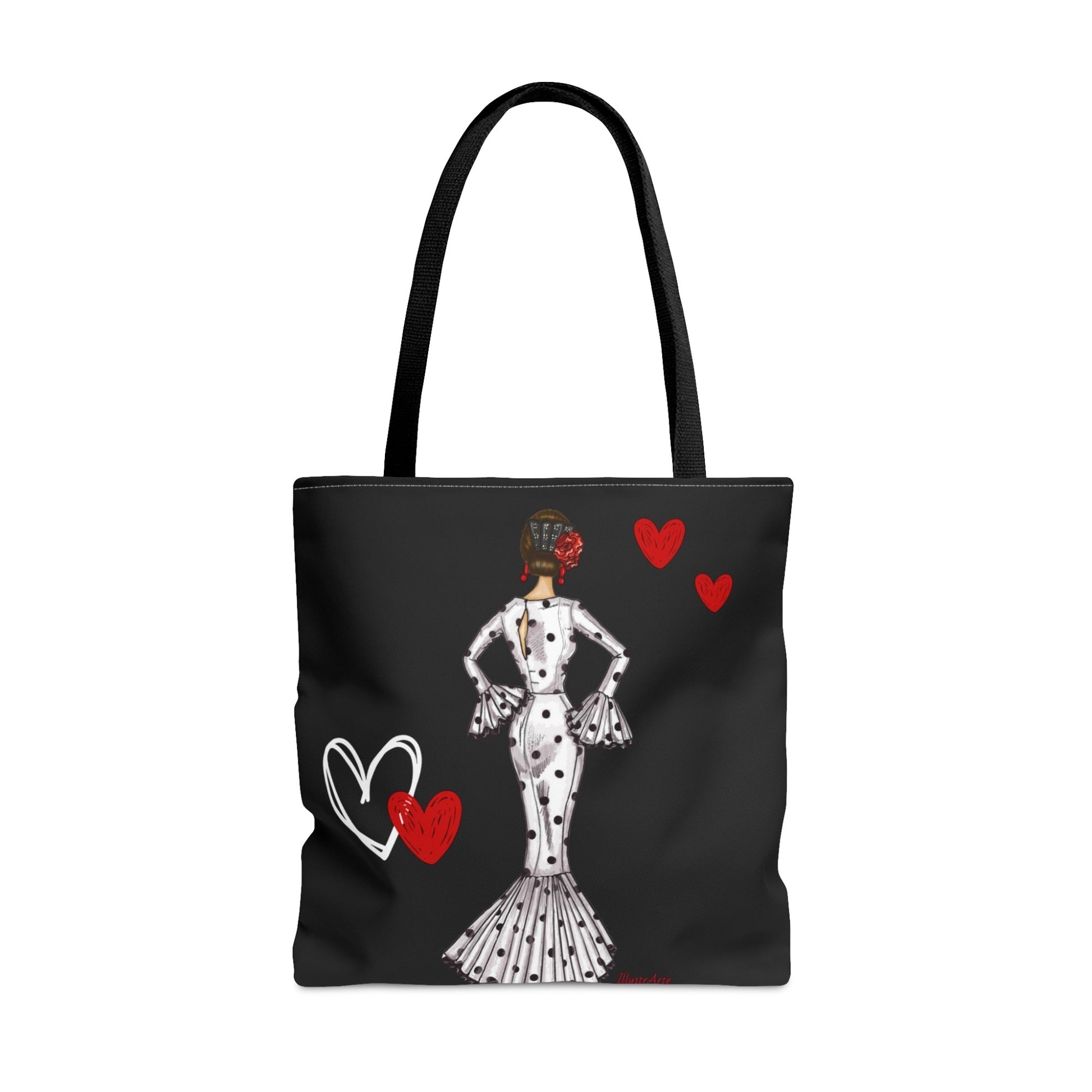 a black and white tote bag with a picture of a woman in a dress