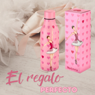 a pink bottle with a picture of a ballerina on it