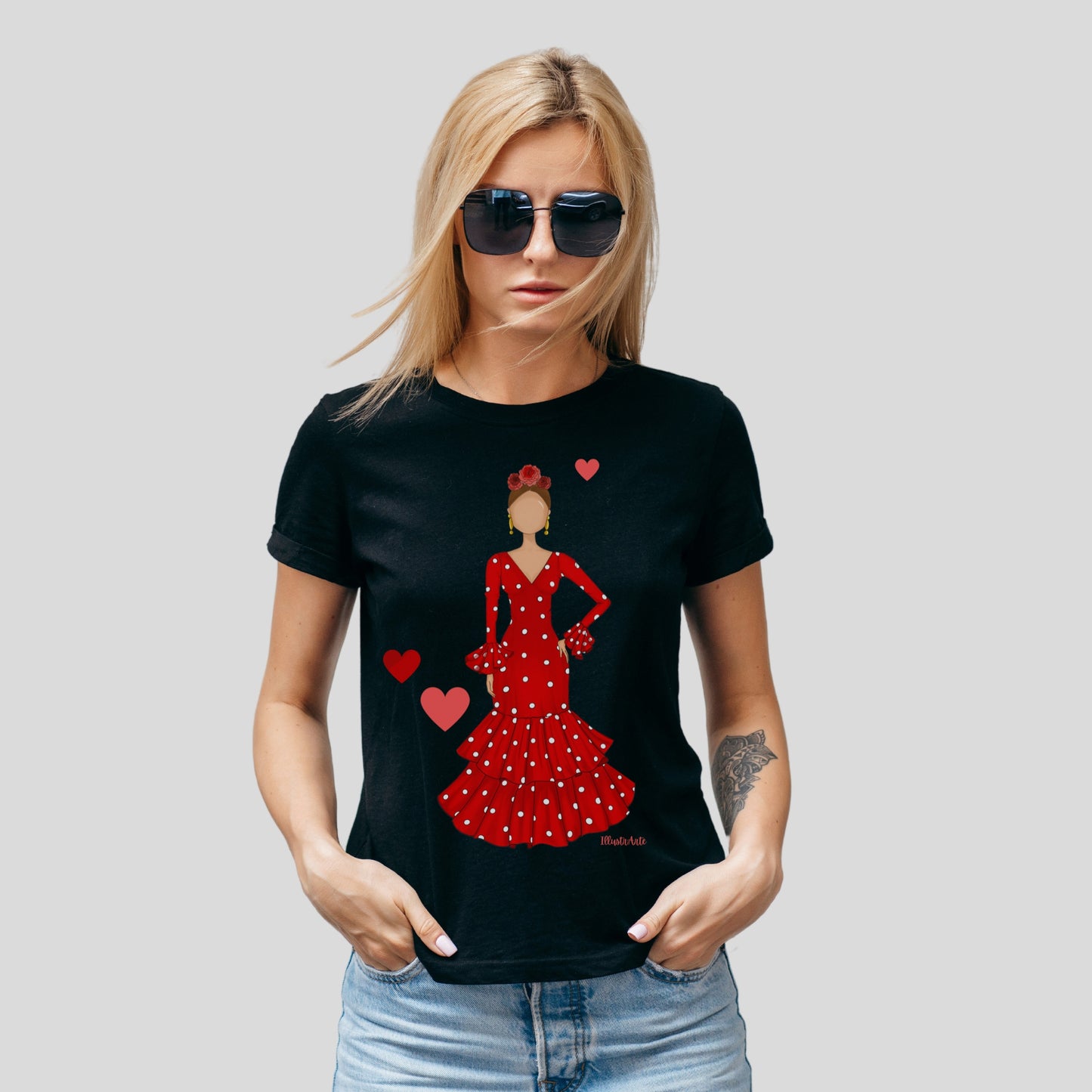 a woman wearing a red dress with hearts on it