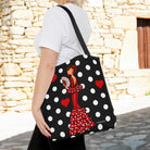 Vista de la bolsa tote flamenca con impresión a doble cara, mostrando el arte de la flamenca Pepa en un fondo negro.