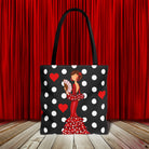 Bolsa tote flamenca de poliéster resistente, ideal para llevar libros y compras, destacando su diseño único.
