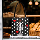 Bolsa tote flamenca reutilizable fabricada en poliéster, mostrando su diseño elegante con la figura de una flamenca.