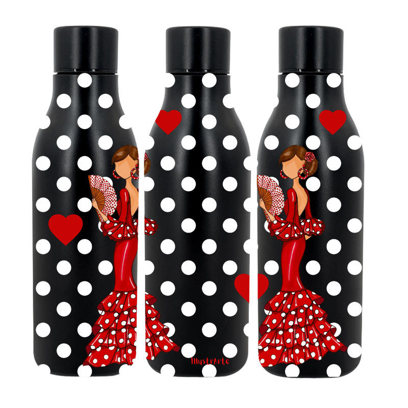 a set of three black and white polka dot bottles