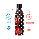 a black and white polka dot bottle with a lady in a red dress