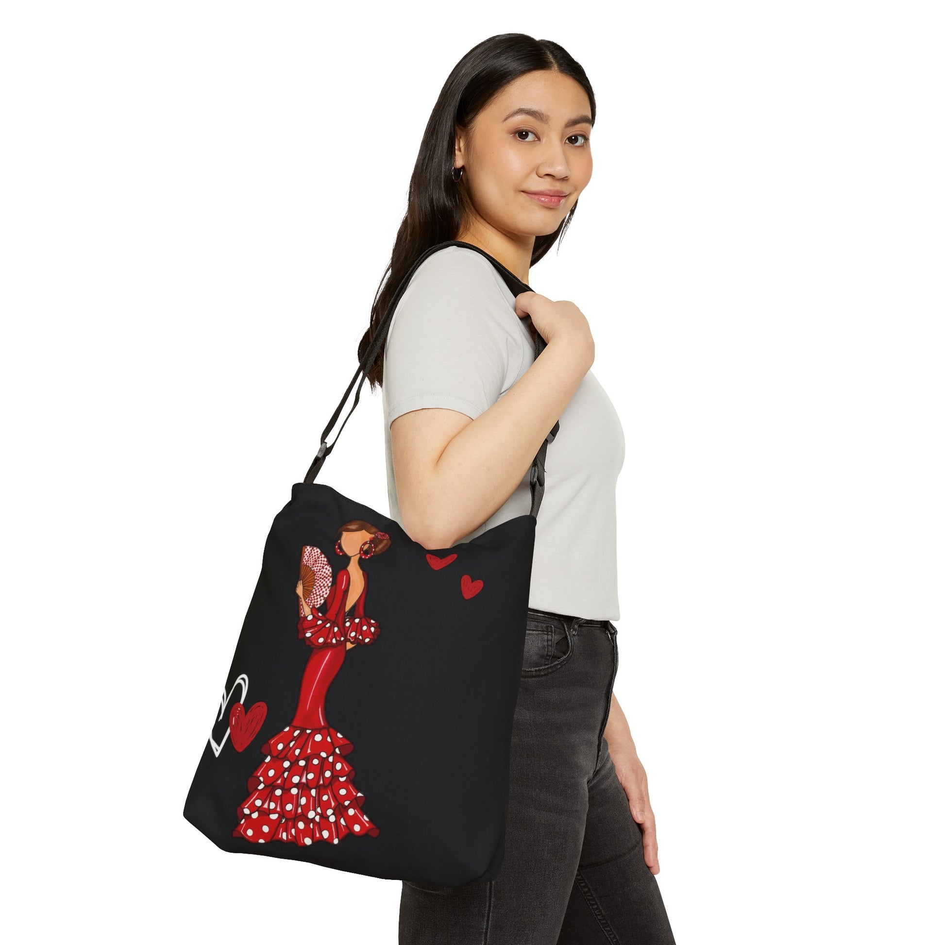 a woman carrying a black bag with a red dress on it