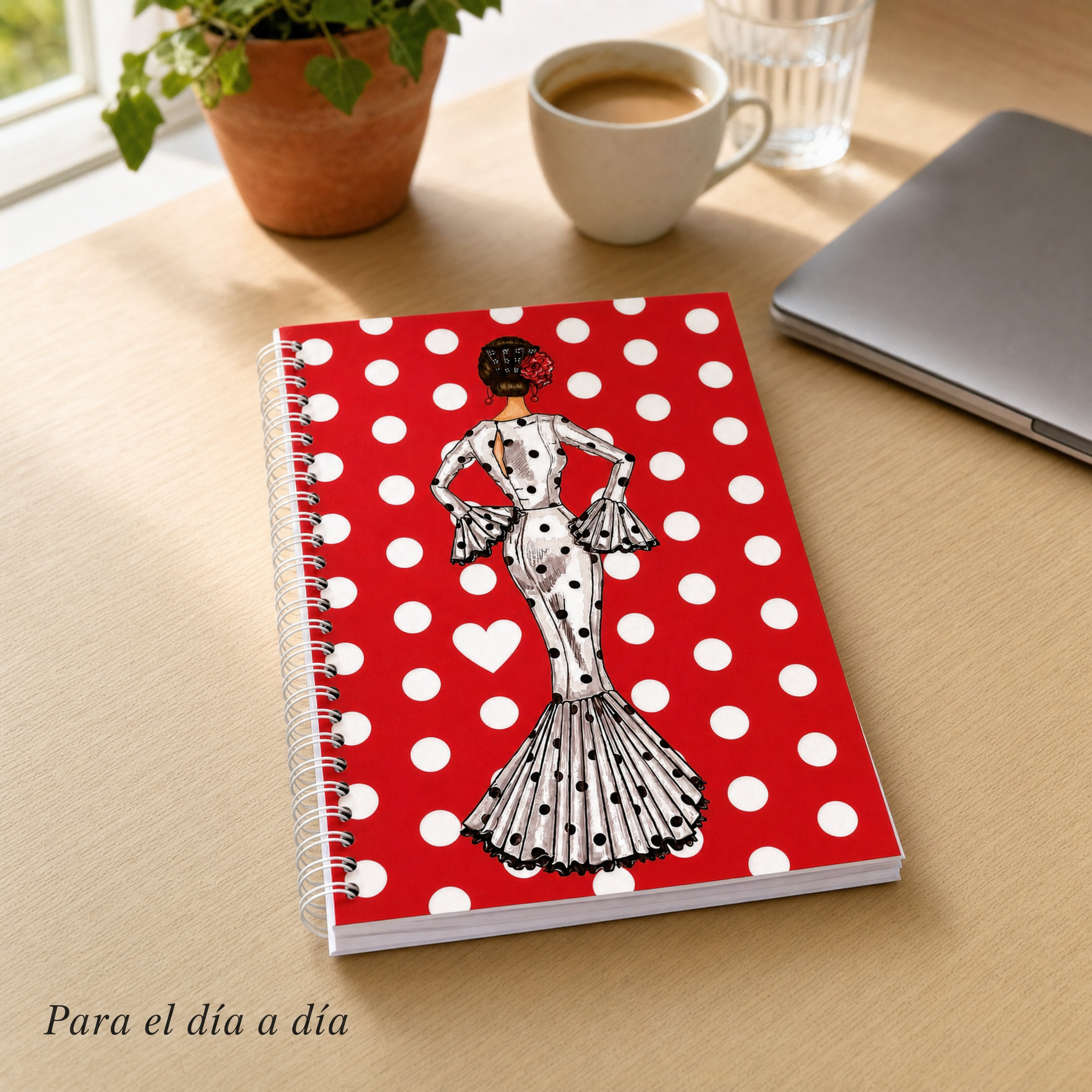 Libreta flamenca María Blanco – sobre un escritorio de madera junto a la ventana