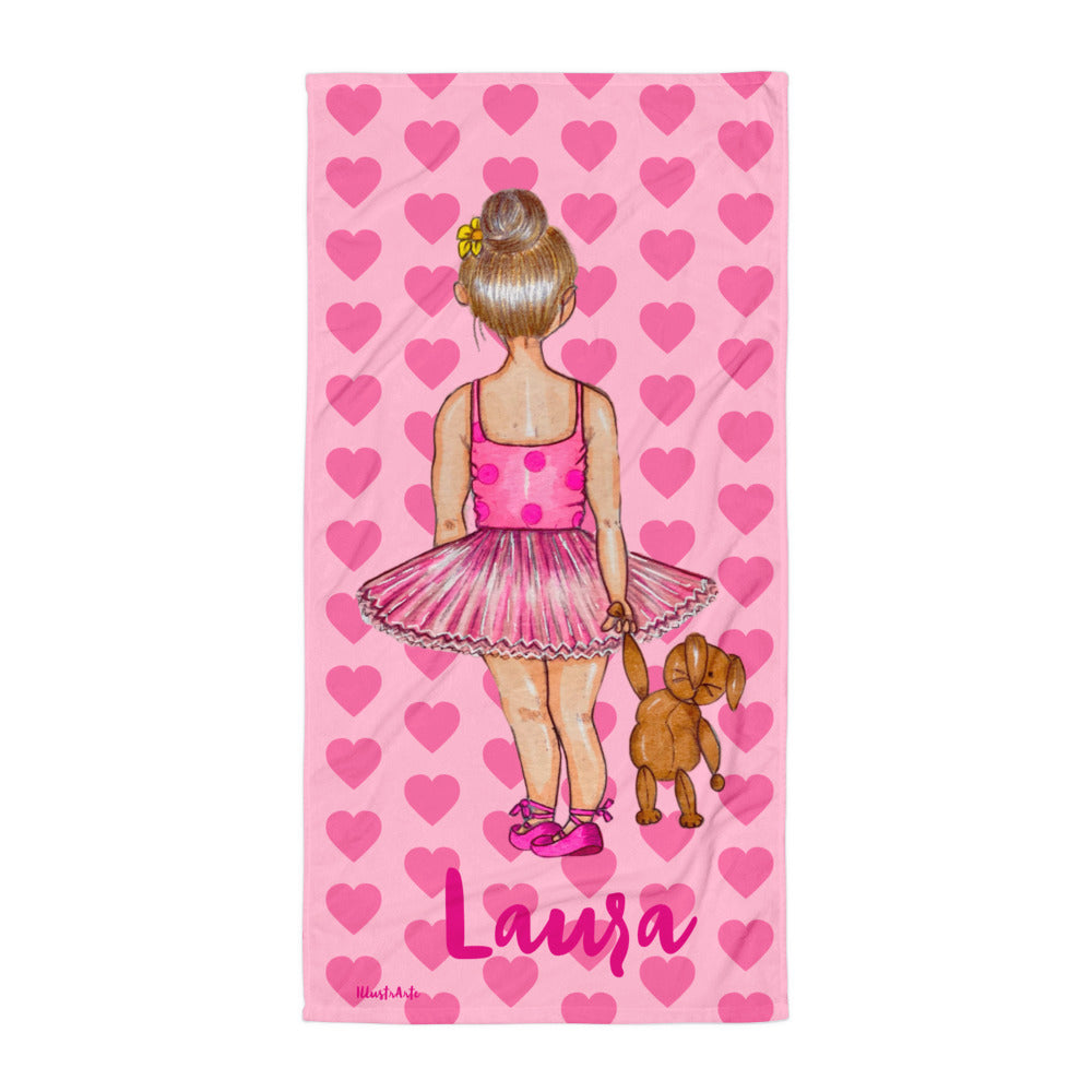 a towel with a picture of a little girl in a pink dress