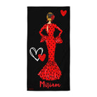 a black and red towel with a woman in a red dress