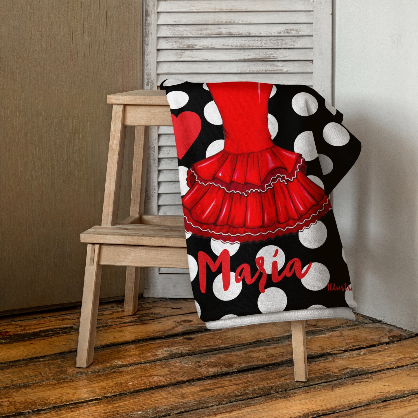 una silla en blanco y negro con un vestido rojo sobre ella