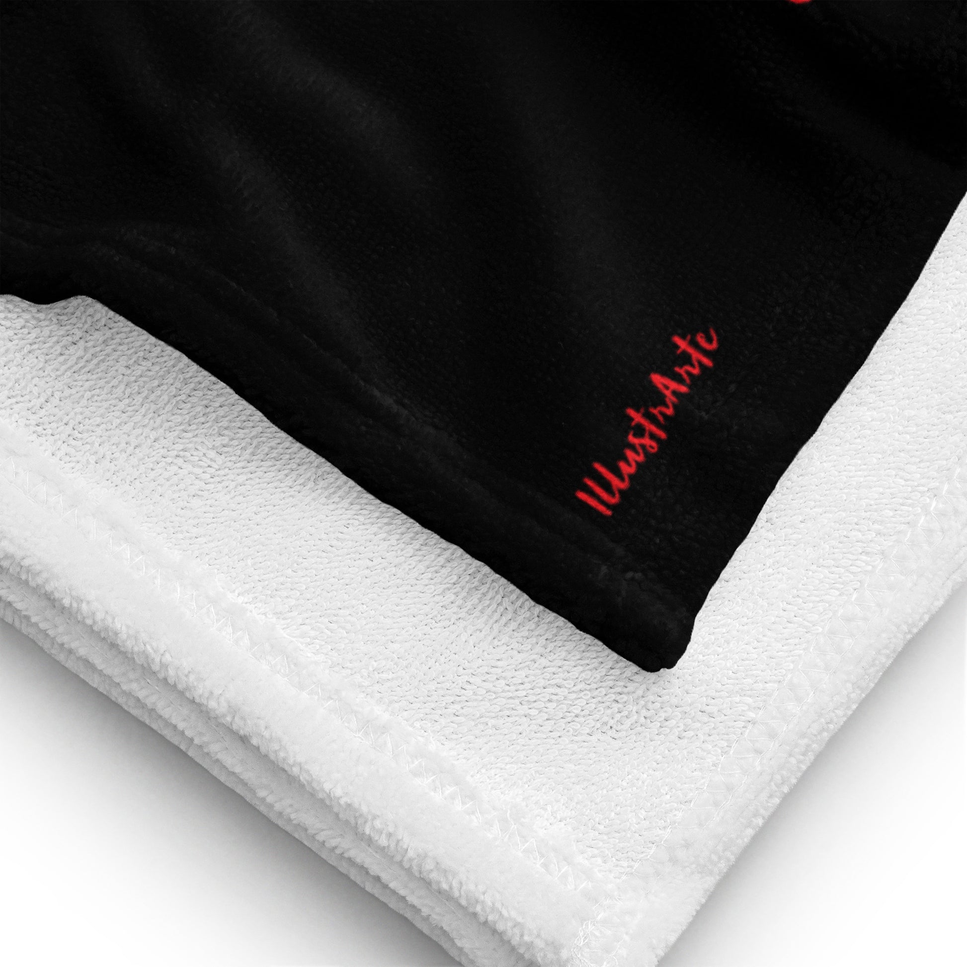 a close up of a black and white towel