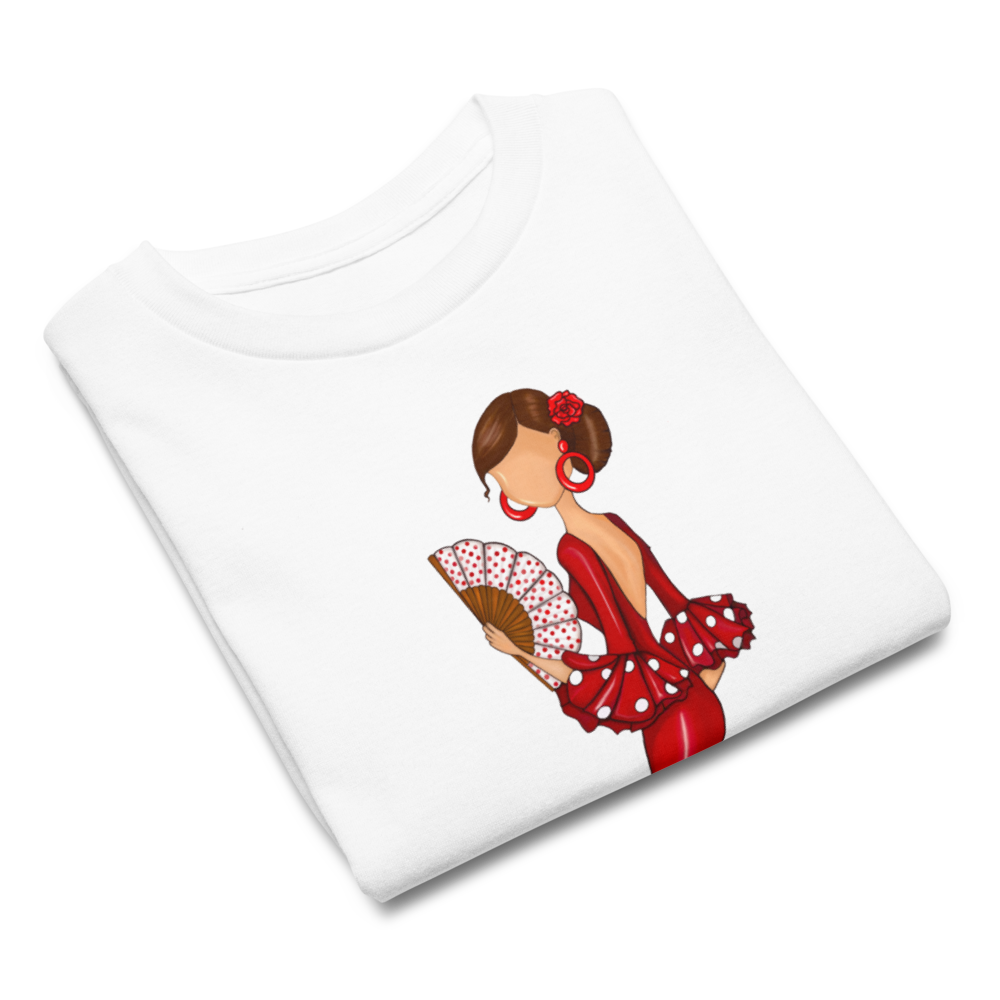 Niña feliz usando la Camiseta Flamenca de Niñas De Algodón 100% Orgánico - Modelo Pepa en un entorno alegre, perfecta para cualquier ocasión.