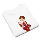 Niña feliz usando la Camiseta Flamenca de Niñas De Algodón 100% Orgánico - Modelo Pepa en un entorno alegre, perfecta para cualquier ocasión.